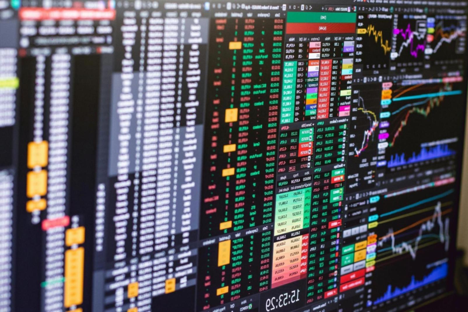 Team meeting discussing blockchain implementation strategy with whiteboards and technical diagrams