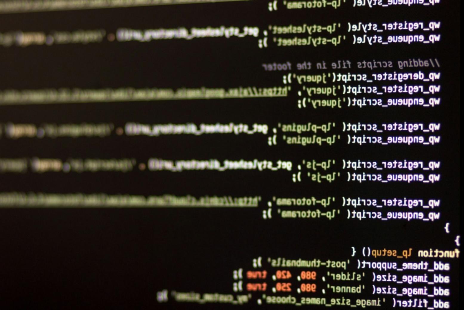 Blockchain development workspace showing multiple screens with smart contract code and network monitoring dashboards