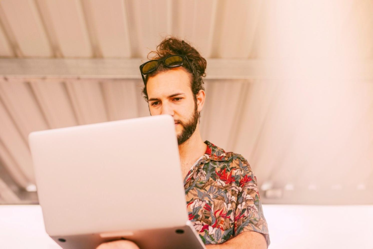 Team collaboration session with blockchain architecture diagrams and development planning materials